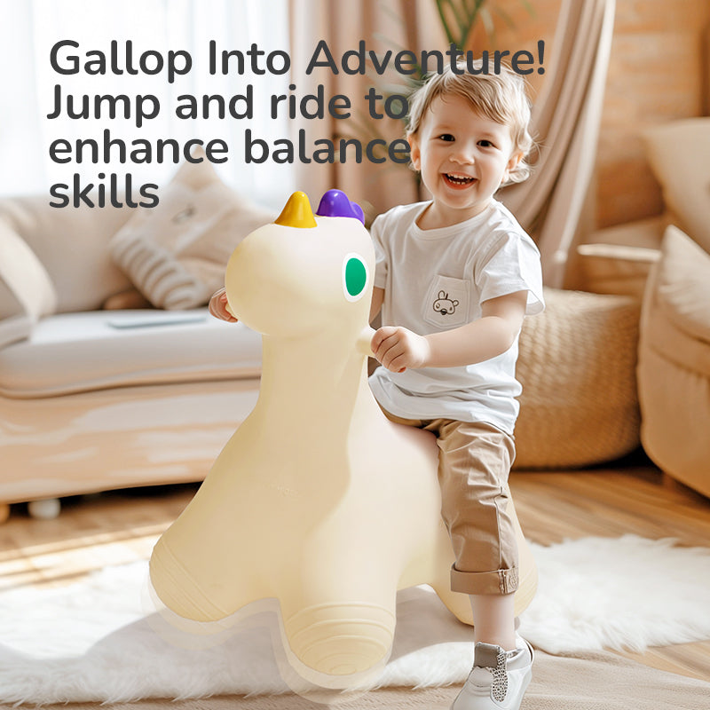 Child riding the white Mideer Joy Bounce inflatable pony indoors