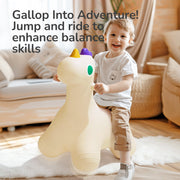 Child riding the white Mideer Joy Bounce inflatable pony indoors